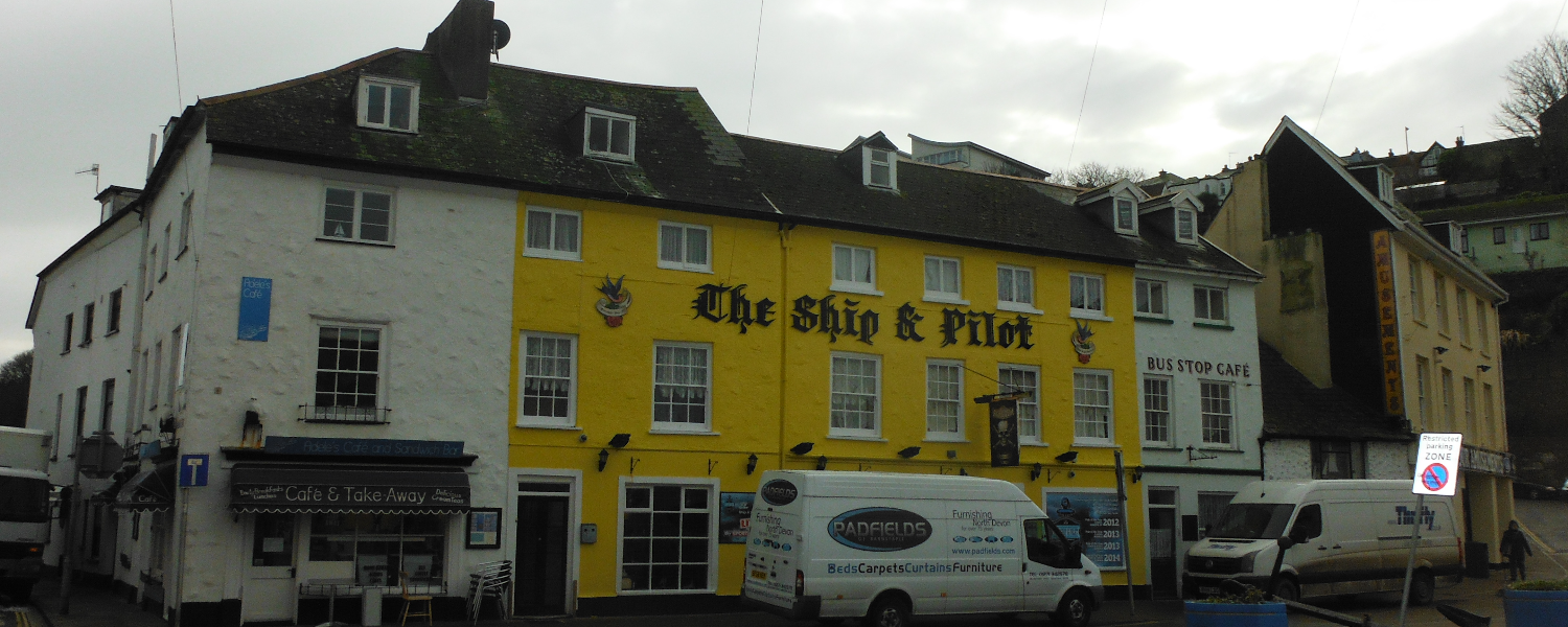 The Ship and Pilot pub, a yellow building in Ilfracombe.